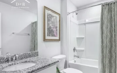 Comparison of Porcelain Slab vs. Large Format Tile for Grout-Free Bathroom Remodeling