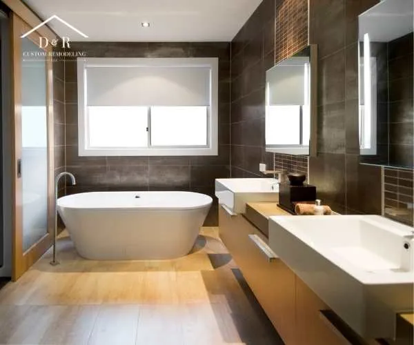bathroom remodeling in Austin TX A modern bathroom featuring dark tiled walls